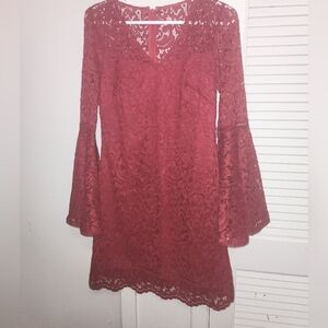Red lace style flare sleeved womens dress in the size 2